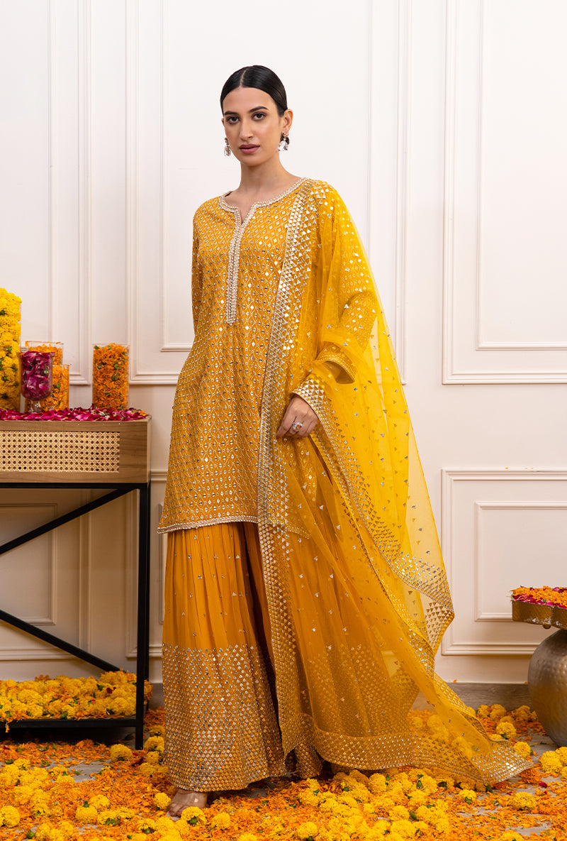 Mehal Kejriwal In Yellow Sitara Mirror Hoor Gharara Set